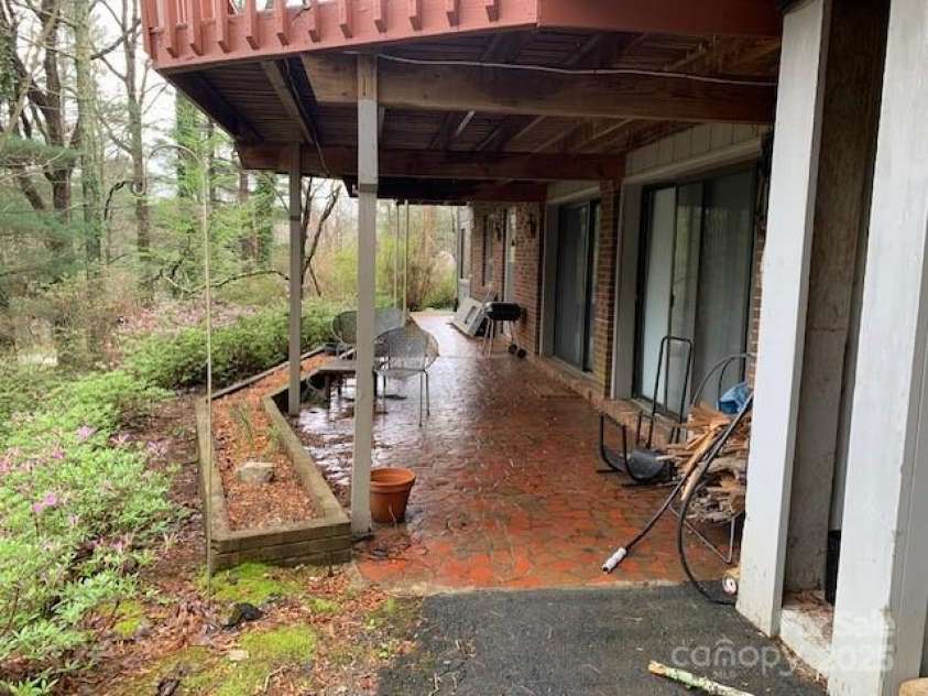 101 LAKEMONT Drive, Flat Rock, NC 28731.  MLS# CAR4246456, YatesRealty ID 257. GIANT UPPER TO DECK ... and private LOWER PATIO, NOTE GLASS TO SEE VIEW!!