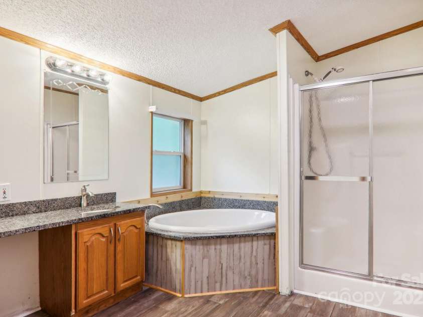 18 Spencer Road, Candler, NC 28715.  MLS# CAR4182190, YatesRealty ID 25702. 