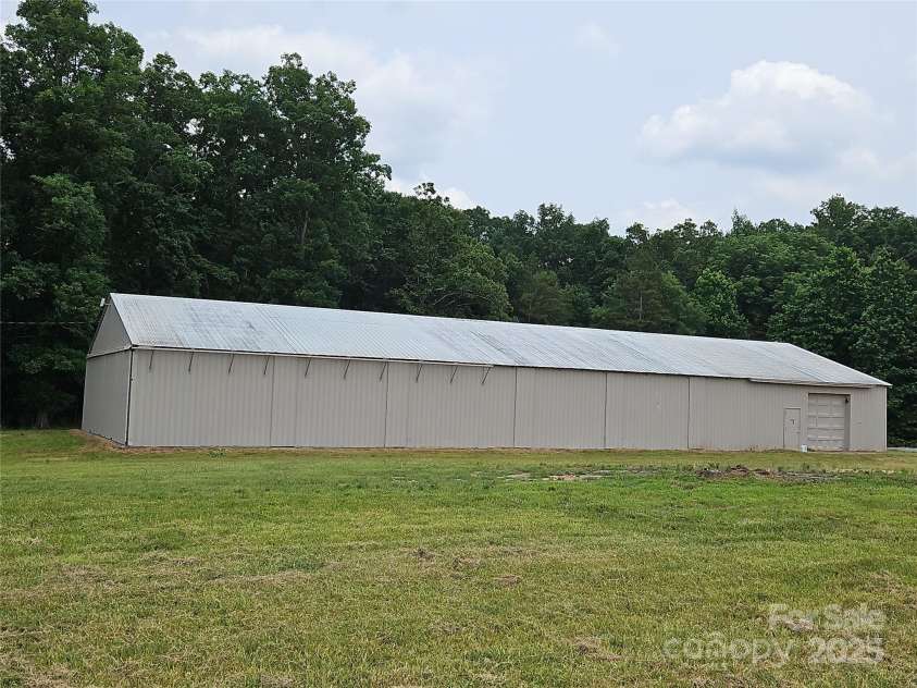 2905 Medlin Road, Monroe, NC 28112.  MLS# CAR4267802, YatesRealty ID 25705. Three door hanger