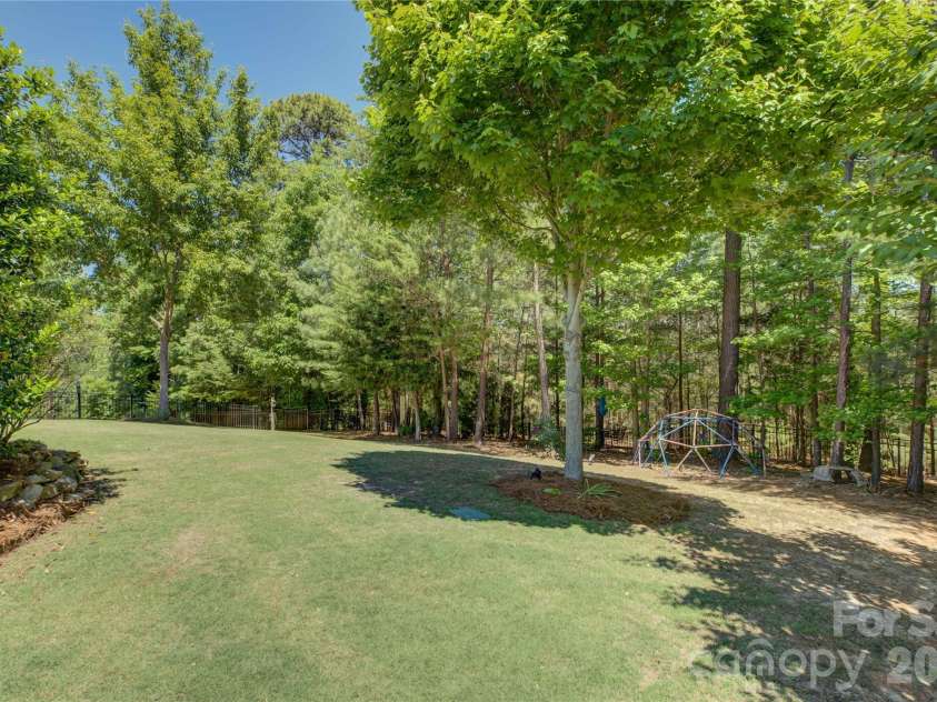 15420 Cimarron Hills Lane, Charlotte, NC 28278.  MLS# CAR4376037, YatesRealty ID 25706. An incredible back yard on the golf course
