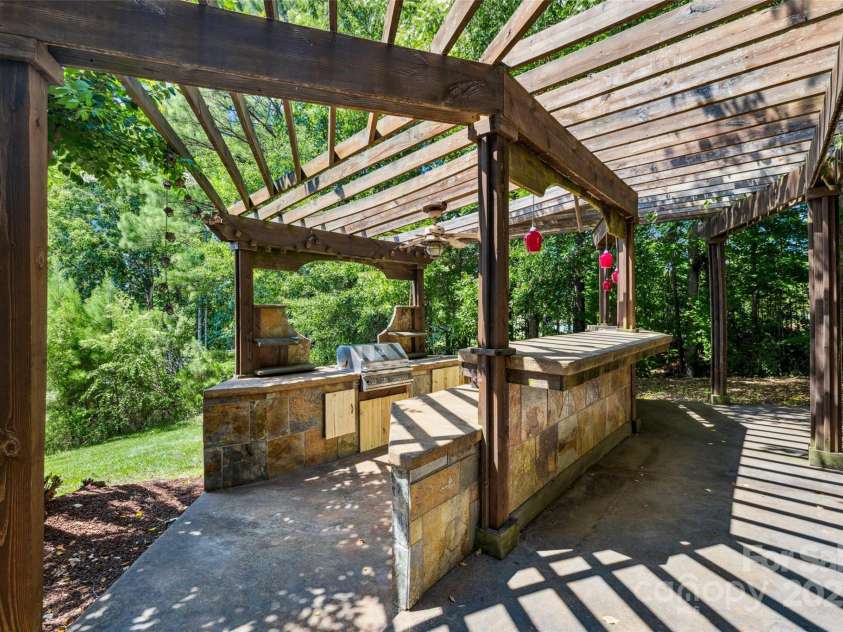 9142 Drayton Lane, Indian Land, SC 29707.  MLS# CAR4275785, YatesRealty ID 25707. Custom outdoor kitchen area