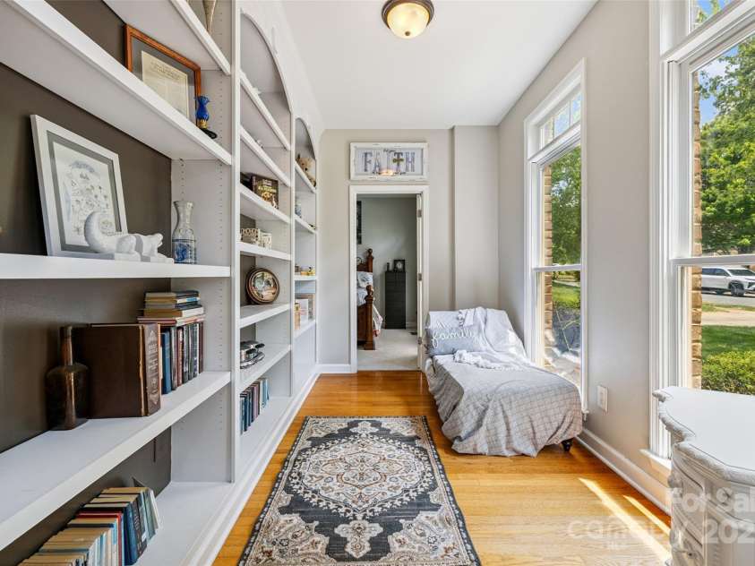 9142 Drayton Lane, Indian Land, SC 29707.  MLS# CAR4275785, YatesRealty ID 25707. Library Hallway to Guest bedroom