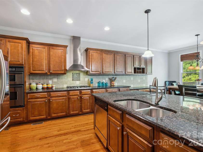 9142 Drayton Lane, Indian Land, SC 29707.  MLS# CAR4275785, YatesRealty ID 25707. Stainless steel appliances, including gas range and wall oven