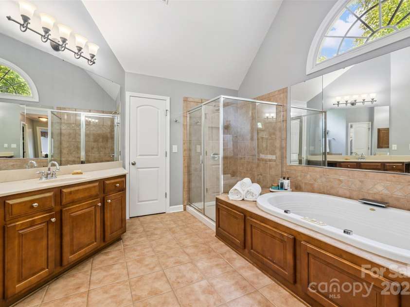 9142 Drayton Lane, Indian Land, SC 29707.  MLS# CAR4275785, YatesRealty ID 25707. There's even a convenient closet that passes through the bathroom to the laundry room on the other side