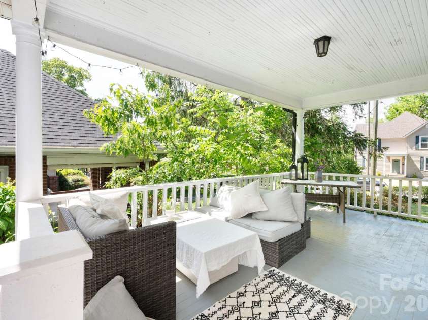 84 Forest Hill Drive, Asheville, NC 28803.  MLS# CAR4381342, YatesRealty ID 25709. Cozy, Covered Side Porch