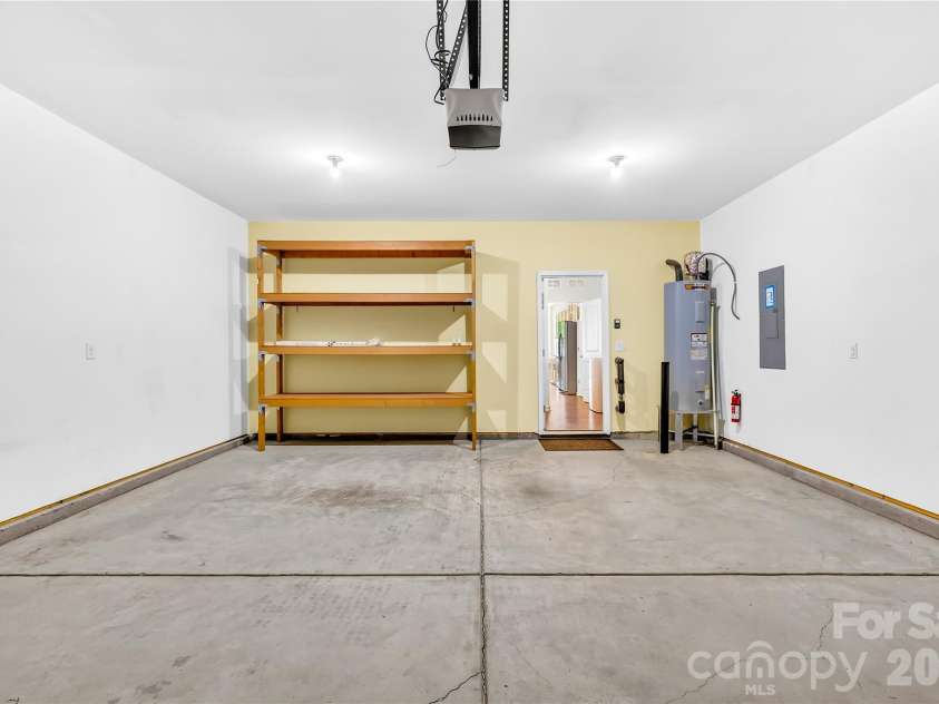 106 Southhampton Street, Mooresville, NC 28115.  MLS# CAR4373021, YatesRealty ID 25714. Garage storage shelves convey!