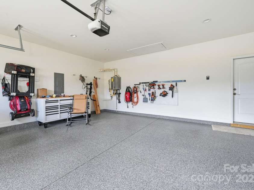 4058 Sagemont Drive, Concord, NC 28027.  MLS# CAR4318082, YatesRealty ID 2572. Garage with epoxy floors 