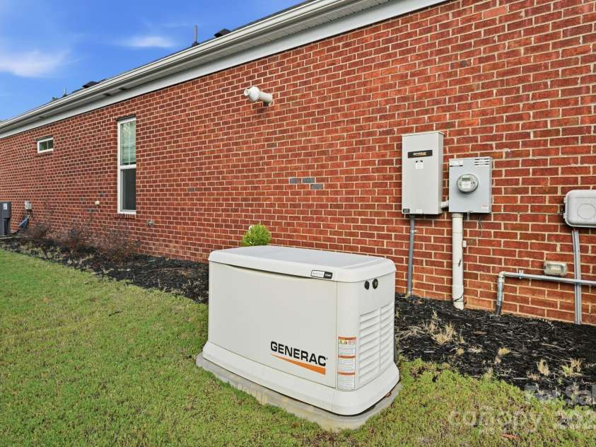 4058 Sagemont Drive, Concord, NC 28027.  MLS# CAR4318082, YatesRealty ID 2572. Genrec whole home generator