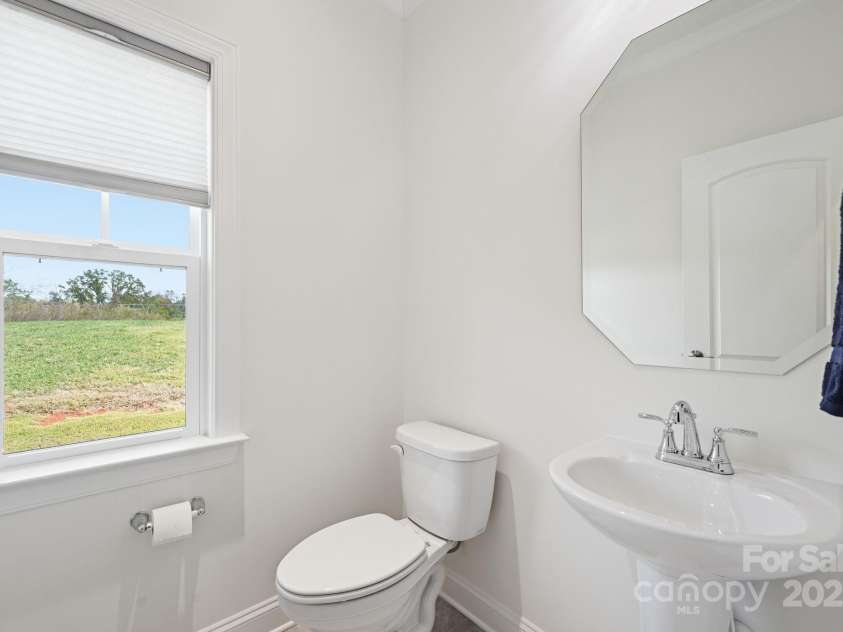 4058 Sagemont Drive, Concord, NC 28027.  MLS# CAR4318082, YatesRealty ID 2572. Half bath 