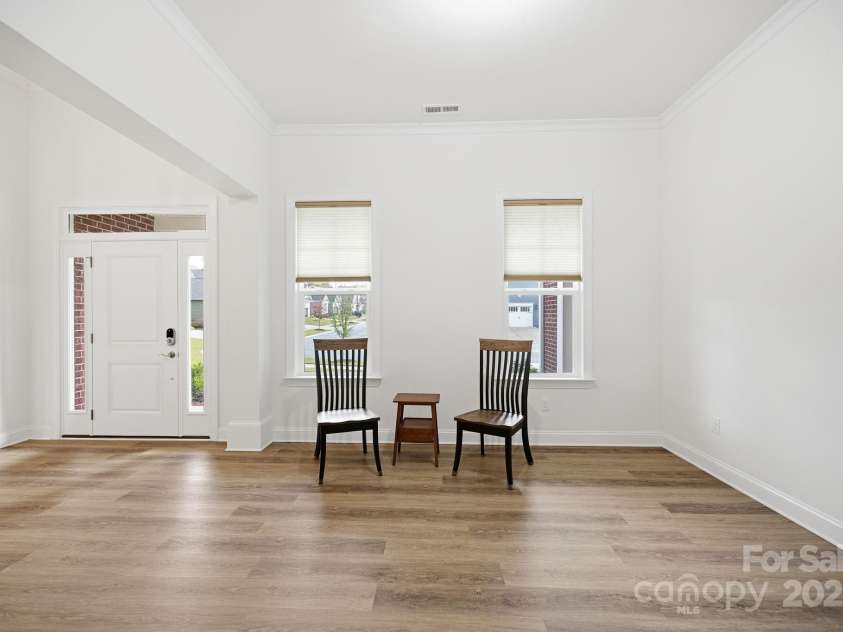 4058 Sagemont Drive, Concord, NC 28027.  MLS# CAR4318082, YatesRealty ID 2572. Large dining room 