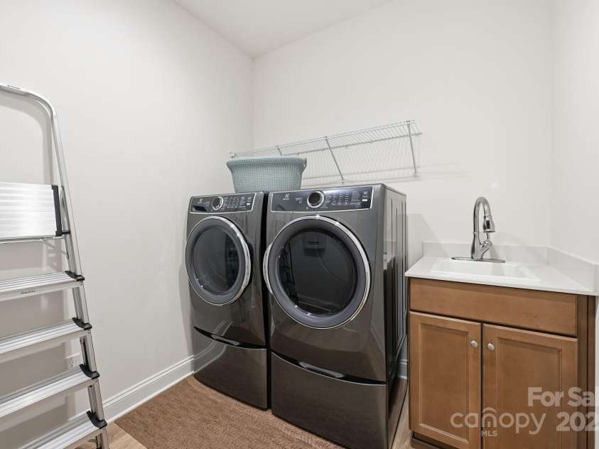4058 Sagemont Drive, Concord, NC 28027.  MLS# CAR4318082, YatesRealty ID 2572. Laundry room with sink