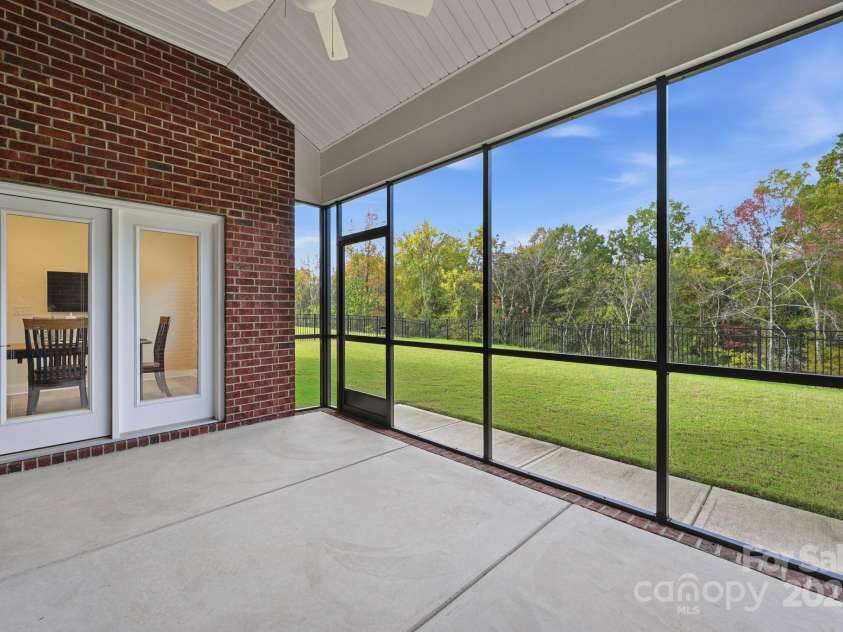 4058 Sagemont Drive, Concord, NC 28027.  MLS# CAR4318082, YatesRealty ID 2572. Screened in patio