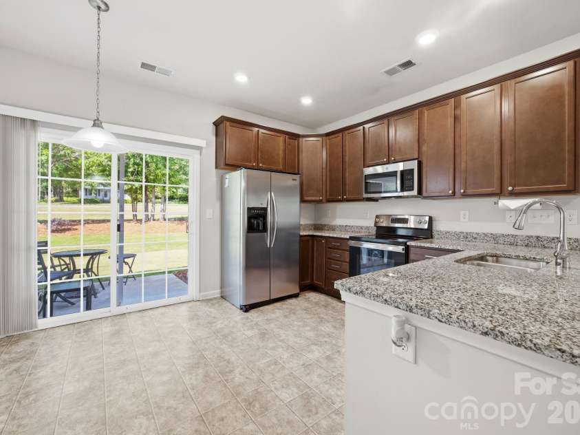 324 Zocalo Drive, Gastonia, NC 28056.  MLS# CAR4372963, YatesRealty ID 25723. Kitchen Dinning area