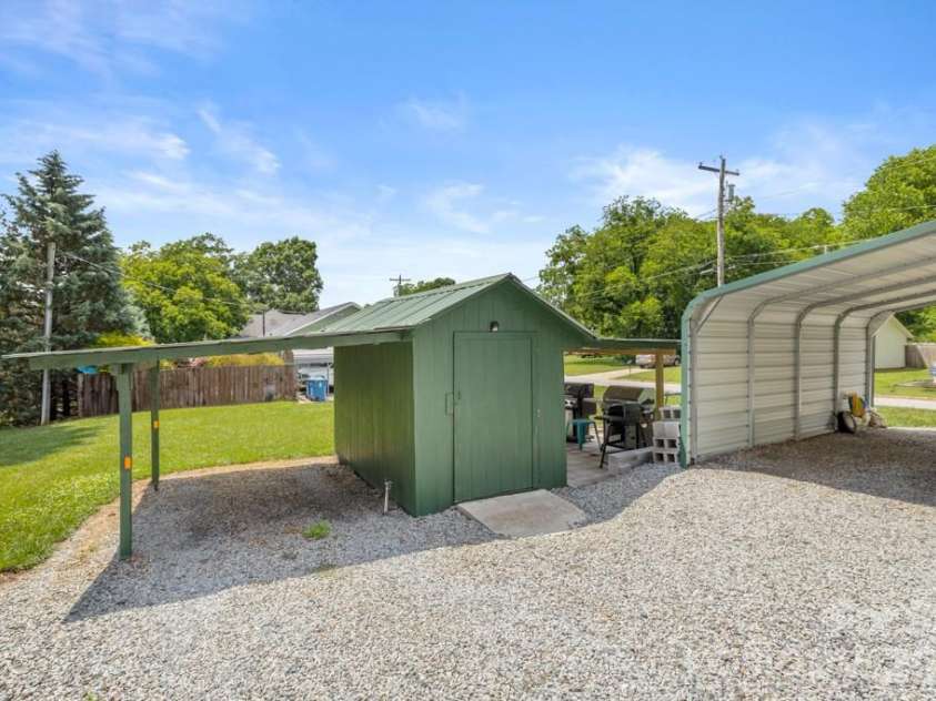 110 Main Avenue, Maiden, NC 28650.  MLS# CAR4385571, YatesRealty ID 25724. Detached carport and shed with electricity for tools, projects, or extra storage