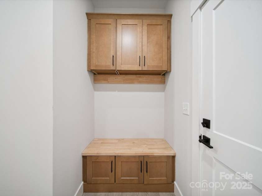 2108 Lakeview Circle, Matthews, NC 28105.  MLS# CAR4275572, YatesRealty ID 25724. Drop Zone inside the Garage Entry