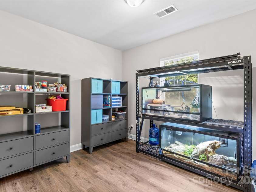 130 Warfield Drive, Mooresville, NC 28115.  MLS# CAR4278096, YatesRealty ID 25728. Bedroom 5 on Main Level