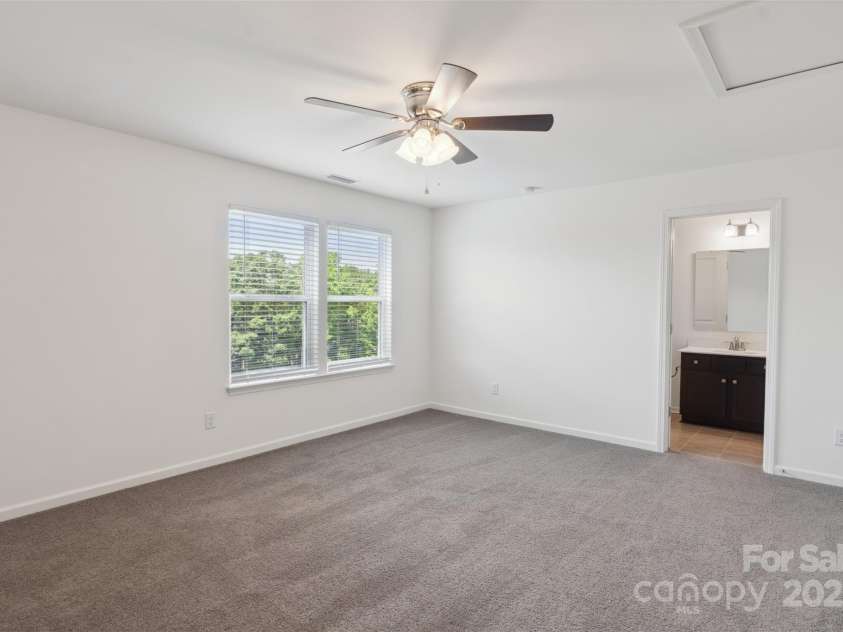 117 Carmine Court, Troutman, NC 28166.  MLS# CAR4269982, YatesRealty ID 2573. Additional primary bedroom with en-suite bathroom