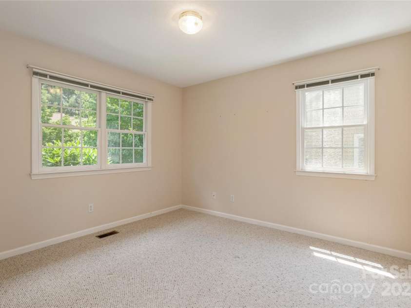 1105 Citation Circle, Hendersonville, NC 28739.  MLS# CAR4278438, YatesRealty ID 25730. Bedroom 2 on main level