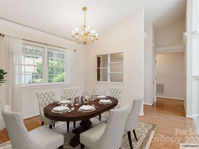 1105 Citation Circle, Hendersonville, NC 28739.  MLS# CAR4278438, YatesRealty ID 25730. Front entry and dining area