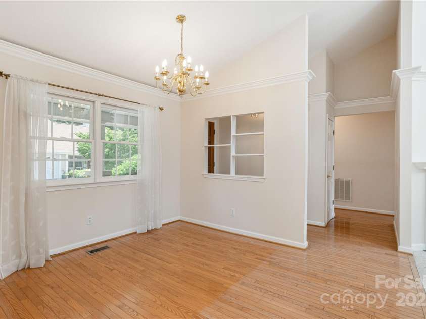 1105 Citation Circle, Hendersonville, NC 28739.  MLS# CAR4278438, YatesRealty ID 25730. Front entry and dining area