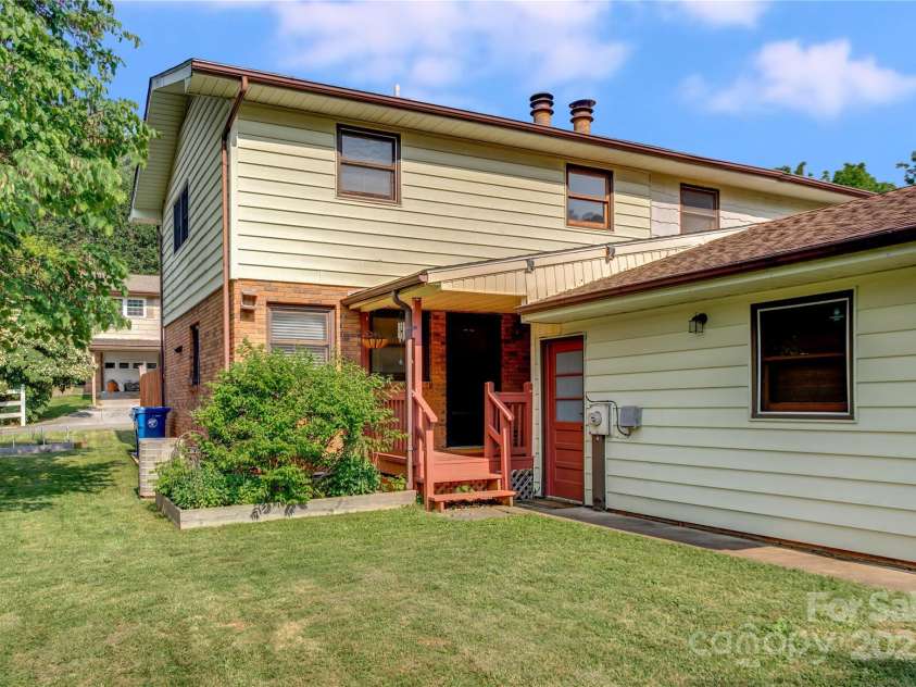 26 Pebblebrook Street, Clyde, NC 28721.  MLS# CAR4268095, YatesRealty ID 25732. A level lawn makes this easy to maintain.