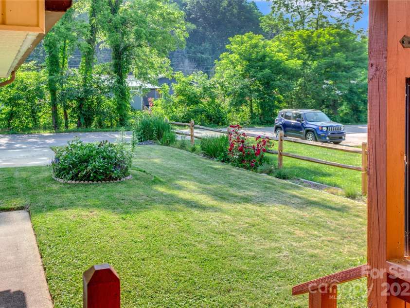 26 Pebblebrook Street, Clyde, NC 28721.  MLS# CAR4268095, YatesRealty ID 25732. Inviting front porch view!