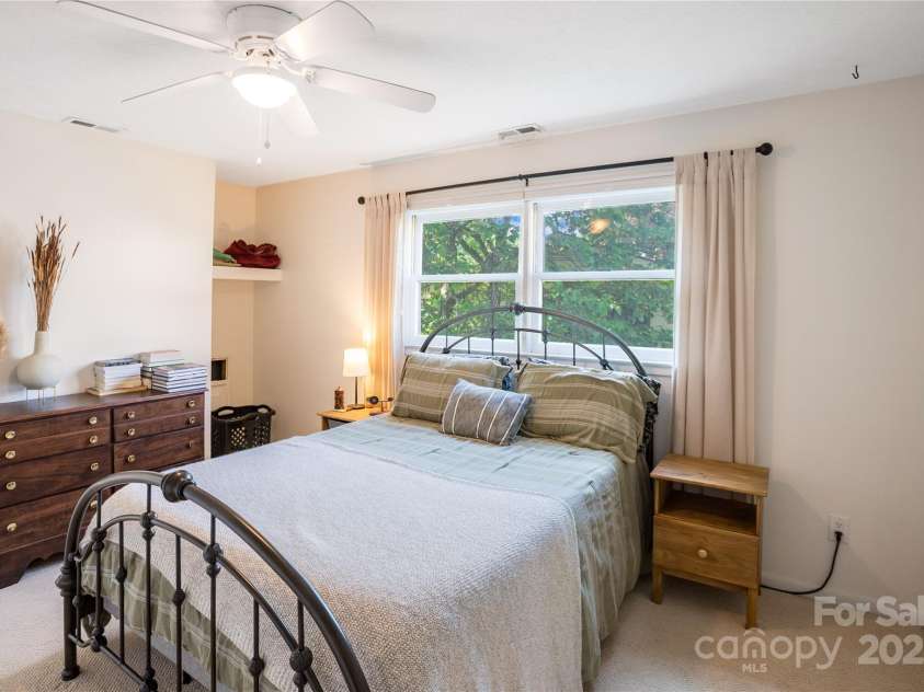 26 Pebblebrook Street, Clyde, NC 28721.  MLS# CAR4268095, YatesRealty ID 25732. Plenty of natural light in primary bedroom. includes shades.