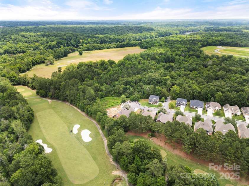 765 Cherry Hills Place, Rock Hill, SC 29730.  MLS# CAR4270626, YatesRealty ID 25736. Green to the right and tee boxes behind the house