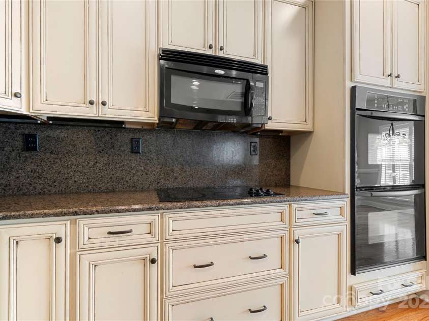 765 Cherry Hills Place, Rock Hill, SC 29730.  MLS# CAR4270626, YatesRealty ID 25736. Raised panel cabinetry and stone countertops