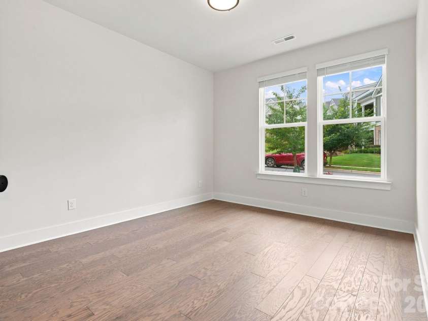 212 Wesser Street, Davidson, NC 28036.  MLS# CAR4381623, YatesRealty ID 25737. Downstairs Bedroom