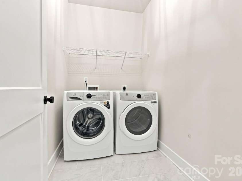 212 Wesser Street, Davidson, NC 28036.  MLS# CAR4381623, YatesRealty ID 25737. Laundry