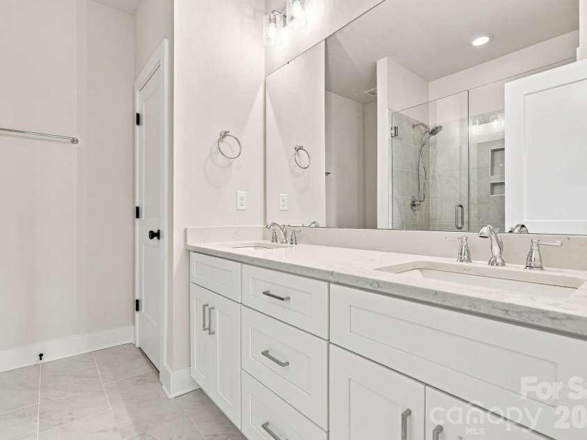 212 Wesser Street, Davidson, NC 28036.  MLS# CAR4381623, YatesRealty ID 25737. Primary Bathroom