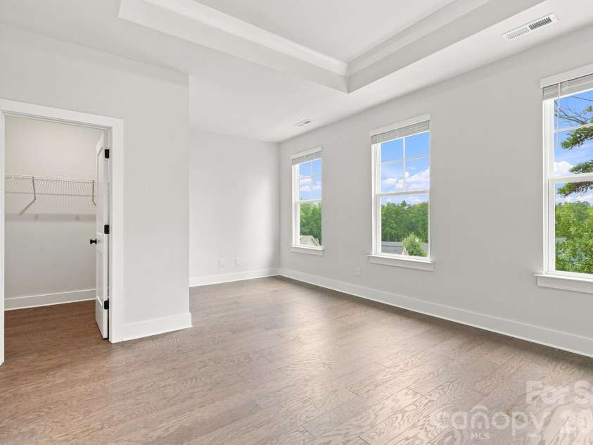 212 Wesser Street, Davidson, NC 28036.  MLS# CAR4381623, YatesRealty ID 25737. Primary Bedroom