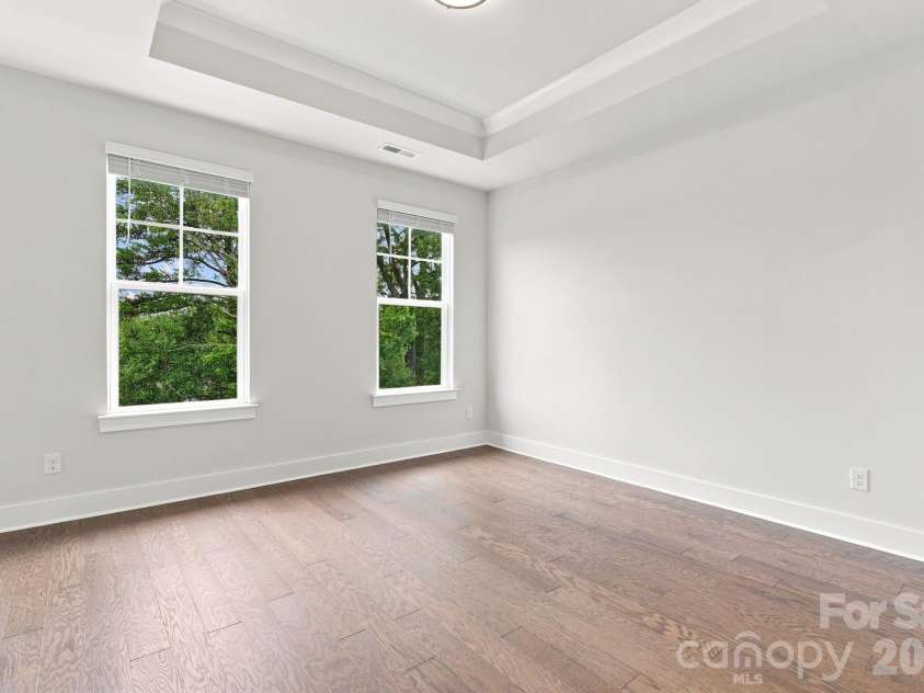 212 Wesser Street, Davidson, NC 28036.  MLS# CAR4381623, YatesRealty ID 25737. Primary Bedroom