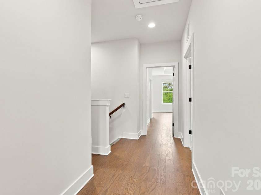 212 Wesser Street, Davidson, NC 28036.  MLS# CAR4381623, YatesRealty ID 25737. Upstair Hallway