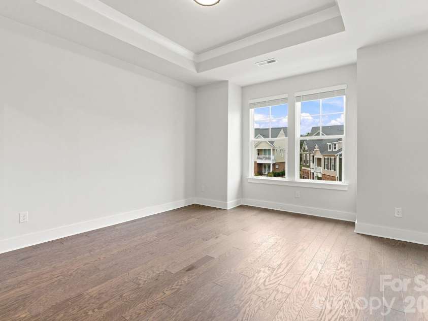 212 Wesser Street, Davidson, NC 28036.  MLS# CAR4381623, YatesRealty ID 25737. Upstairs Bedroom