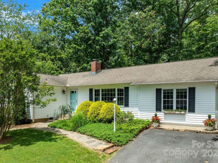 10 Daniel Lane, Black Mountain, NC 28711.  MLS# CAR4274400, YatesRealty ID 25738. Charming Black Mountain Cottage