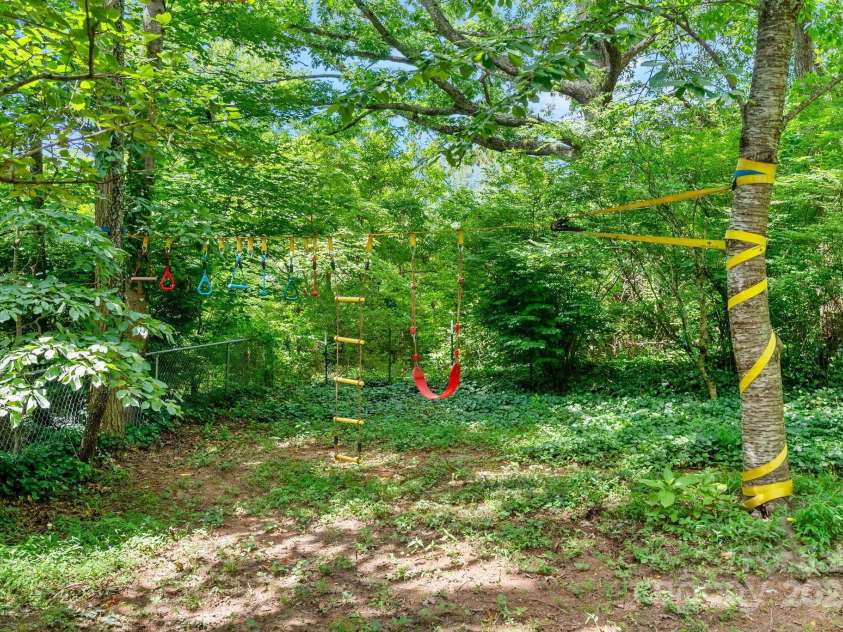 10 Daniel Lane, Black Mountain, NC 28711.  MLS# CAR4274400, YatesRealty ID 25738. Delightful Play Space
