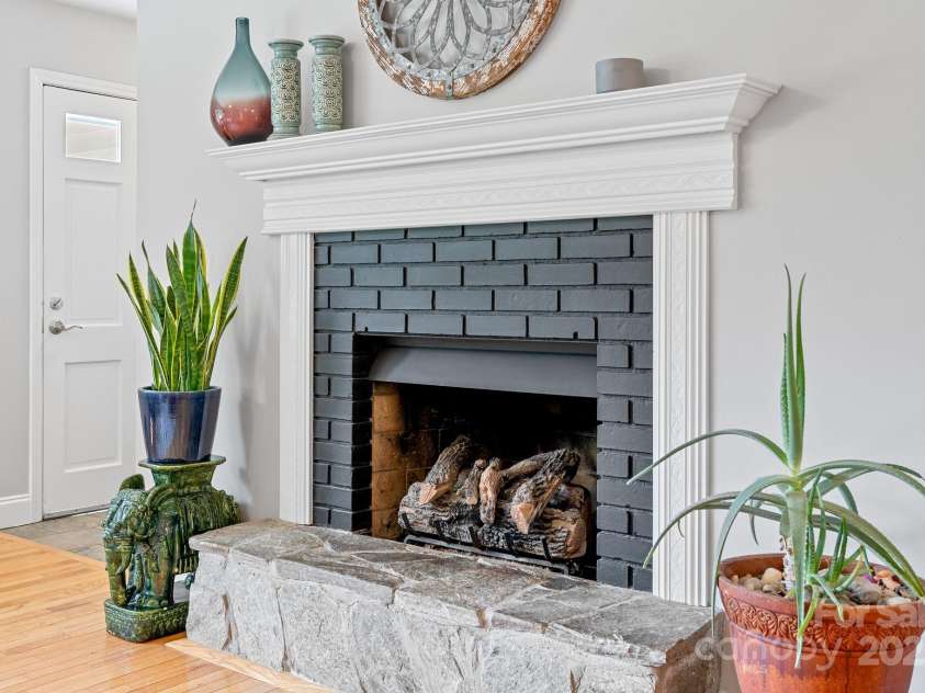 10 Daniel Lane, Black Mountain, NC 28711.  MLS# CAR4274400, YatesRealty ID 25738. Gas Log Fireplace in Living Room