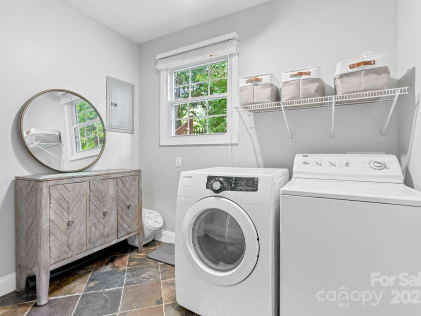 10 Daniel Lane, Black Mountain, NC 28711.  MLS# CAR4274400, YatesRealty ID 25738. Laundy Room off Kitchen with Large Closet and Door to Backyard