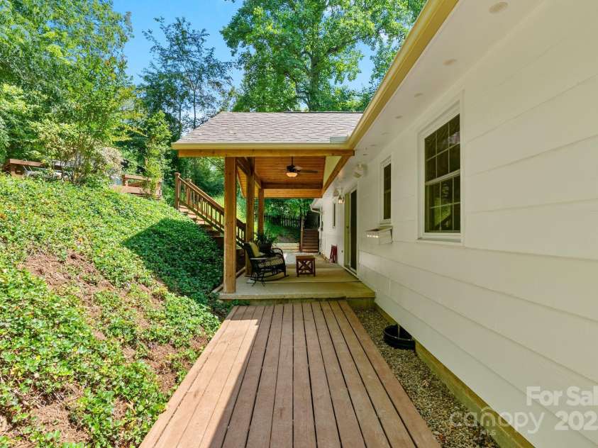 10 Daniel Lane, Black Mountain, NC 28711.  MLS# CAR4274400, YatesRealty ID 25738. Path Leads to Covered Patio and Encapsulated Crawlspace Entrance