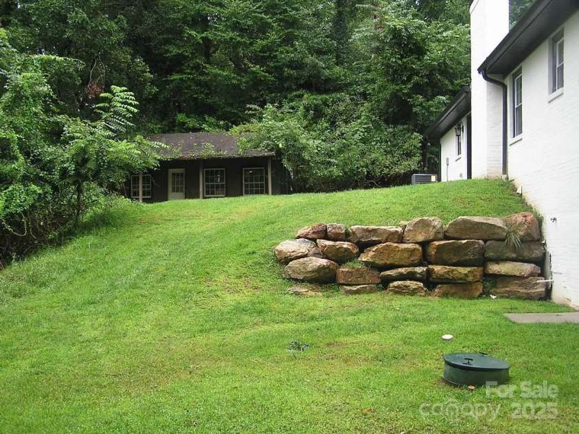 384 New River Heights, Boone, NC 28607.  MLS# CAR4304432, YatesRealty ID 2574. Back Yard