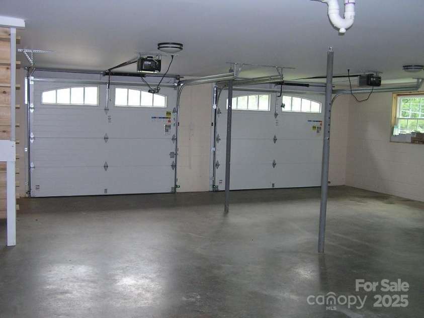 384 New River Heights, Boone, NC 28607.  MLS# CAR4304432, YatesRealty ID 2574. Garage