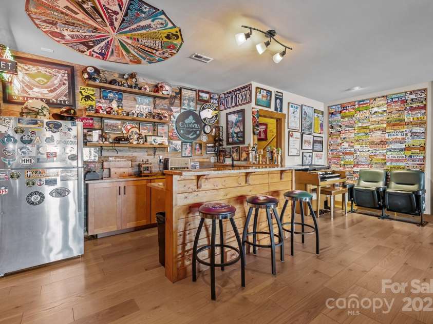 10108 Saw Mill Road, Charlotte, NC 28278.  MLS# CAR4268919, YatesRealty ID 25740. Basement bar area