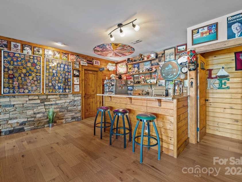 10108 Saw Mill Road, Charlotte, NC 28278.  MLS# CAR4268919, YatesRealty ID 25740. Basement bar area
