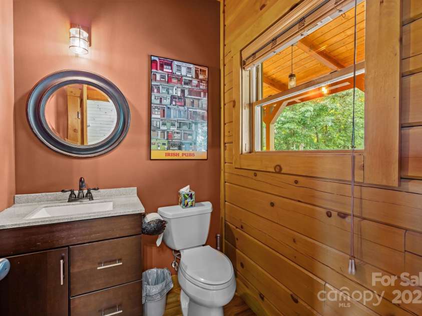 10108 Saw Mill Road, Charlotte, NC 28278.  MLS# CAR4268919, YatesRealty ID 25740. Half bathroom on the main floor
