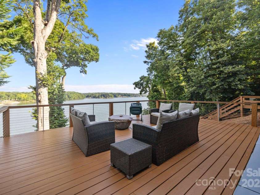 10108 Saw Mill Road, Charlotte, NC 28278.  MLS# CAR4268919, YatesRealty ID 25740. Lower deck with lake views