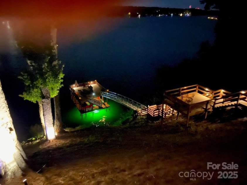10108 Saw Mill Road, Charlotte, NC 28278.  MLS# CAR4268919, YatesRealty ID 25740. Night time view of the dock area