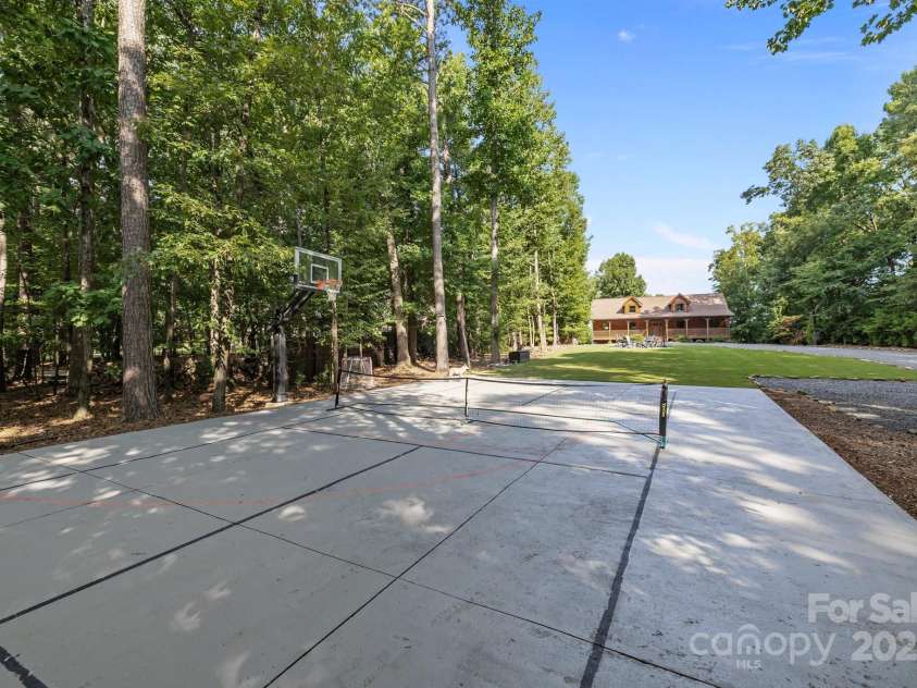 10108 Saw Mill Road, Charlotte, NC 28278.  MLS# CAR4268919, YatesRealty ID 25740. Your own pickleball court