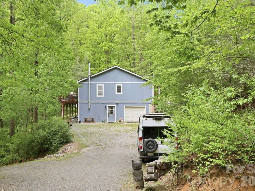 302 Rich Mountain Road, Flat Rock, NC 28731.  MLS# CAR4379587, YatesRealty ID 25740. 